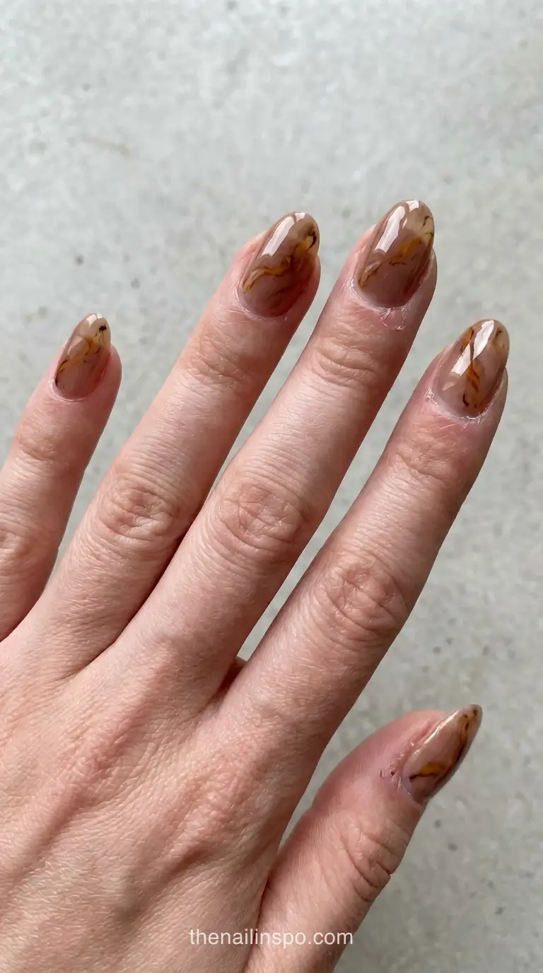Amber Marble Veins Oval Nails