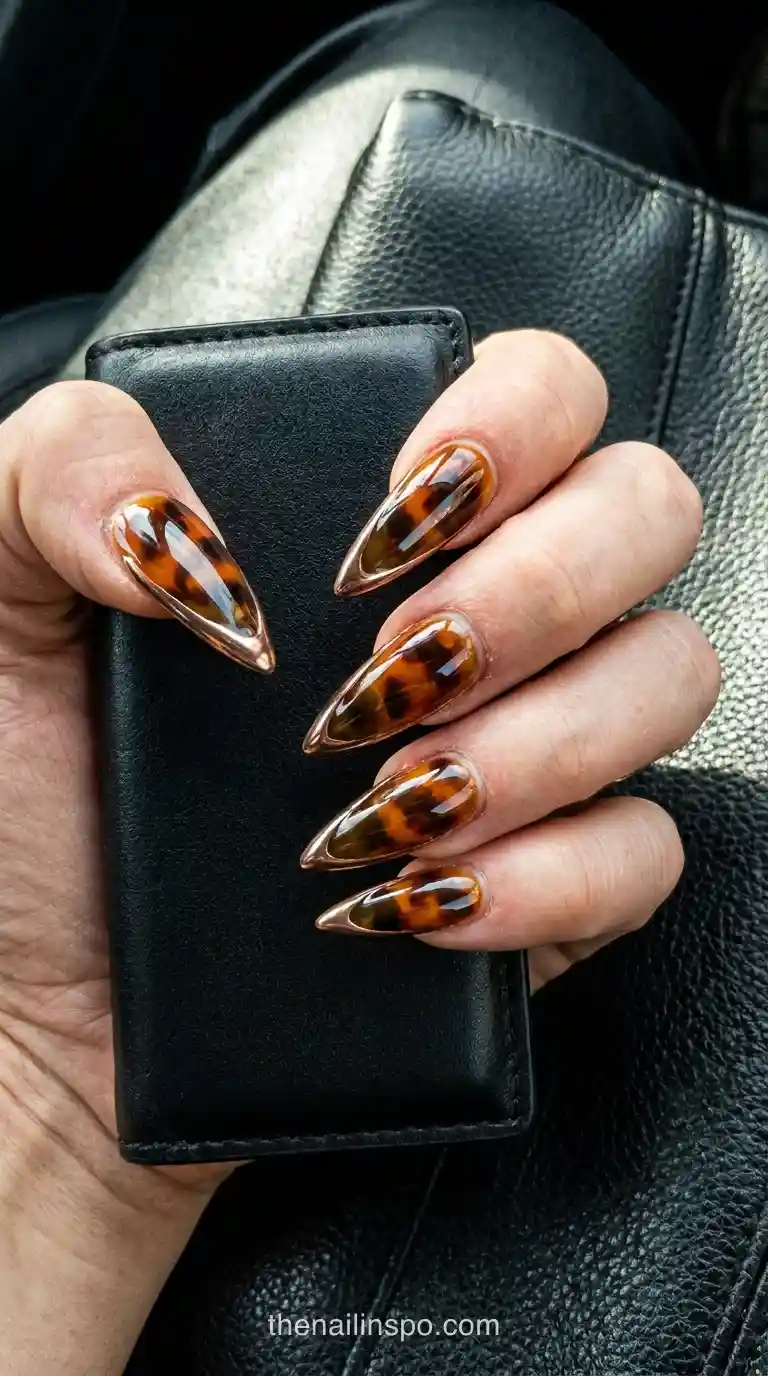 Tortoiseshell Chrome Outline Stiletto Nails